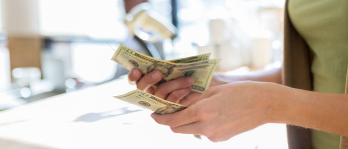 woman-counting-money-in-her-hands